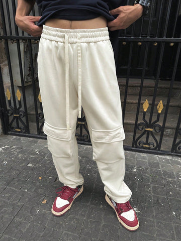 Men Solid Color Drawstring Waist Casual Cargo Pants