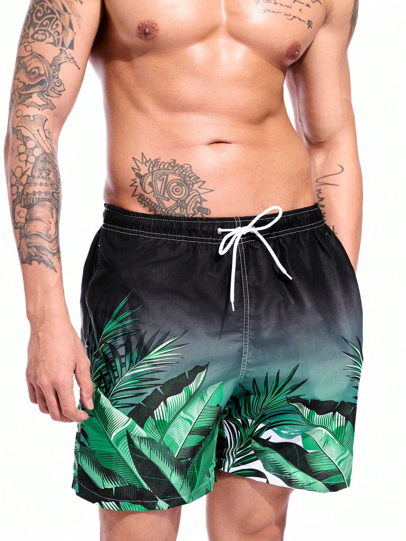 Men Tropical Plant Printed Drawstring Waist Loose Beach Shorts For Holiday