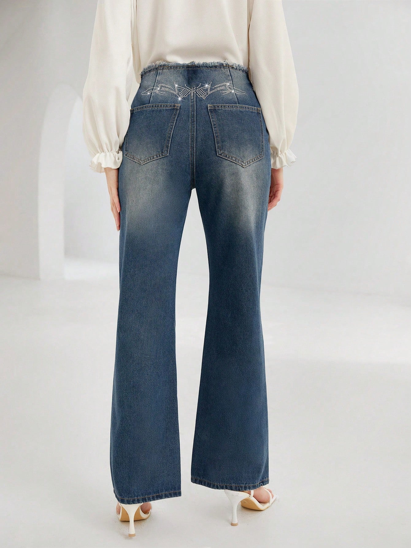 Raw Trim Flare Leg Jeans