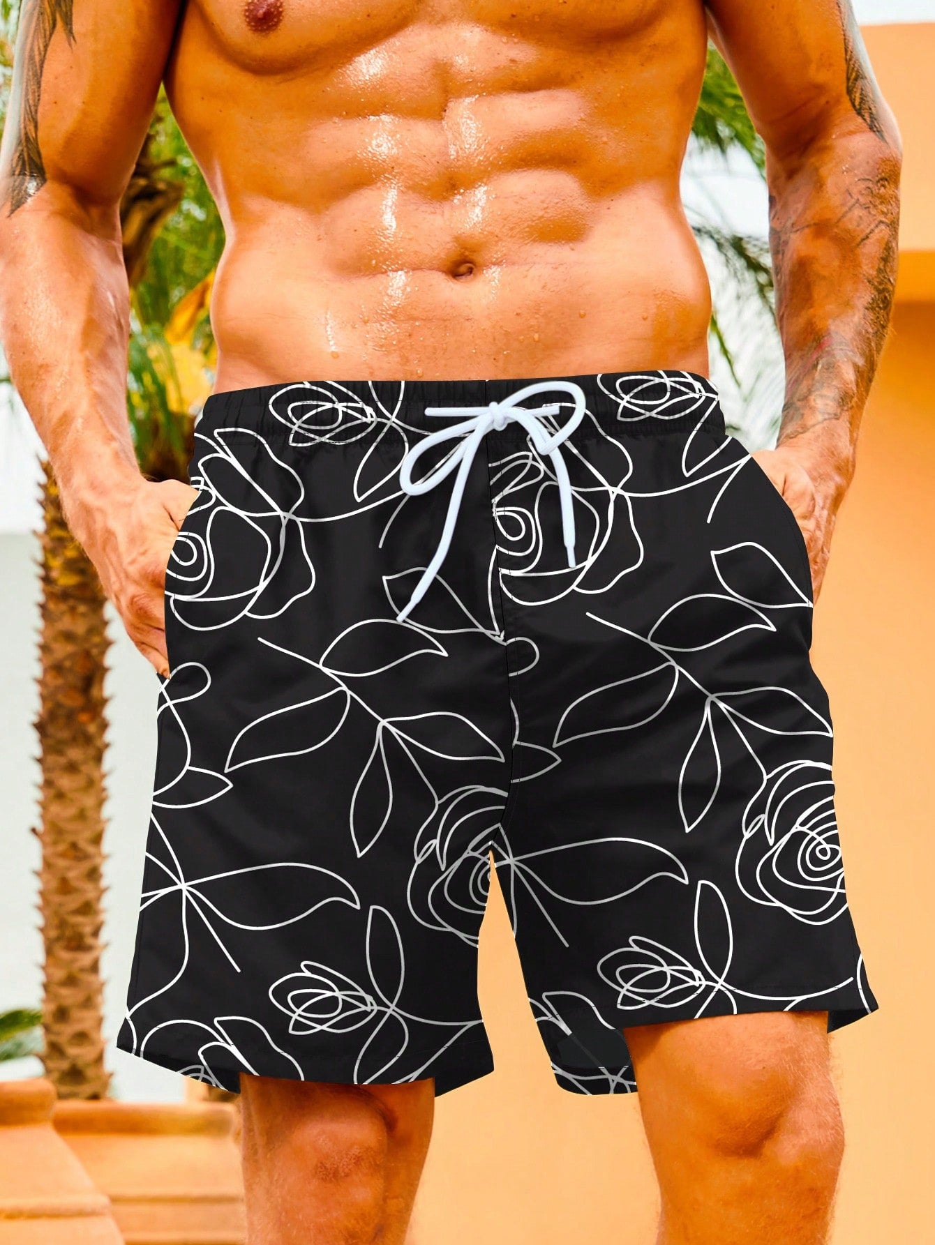 Men's Vacation Plant Printed Drawstring Elastic Waist Loose Beach Shorts