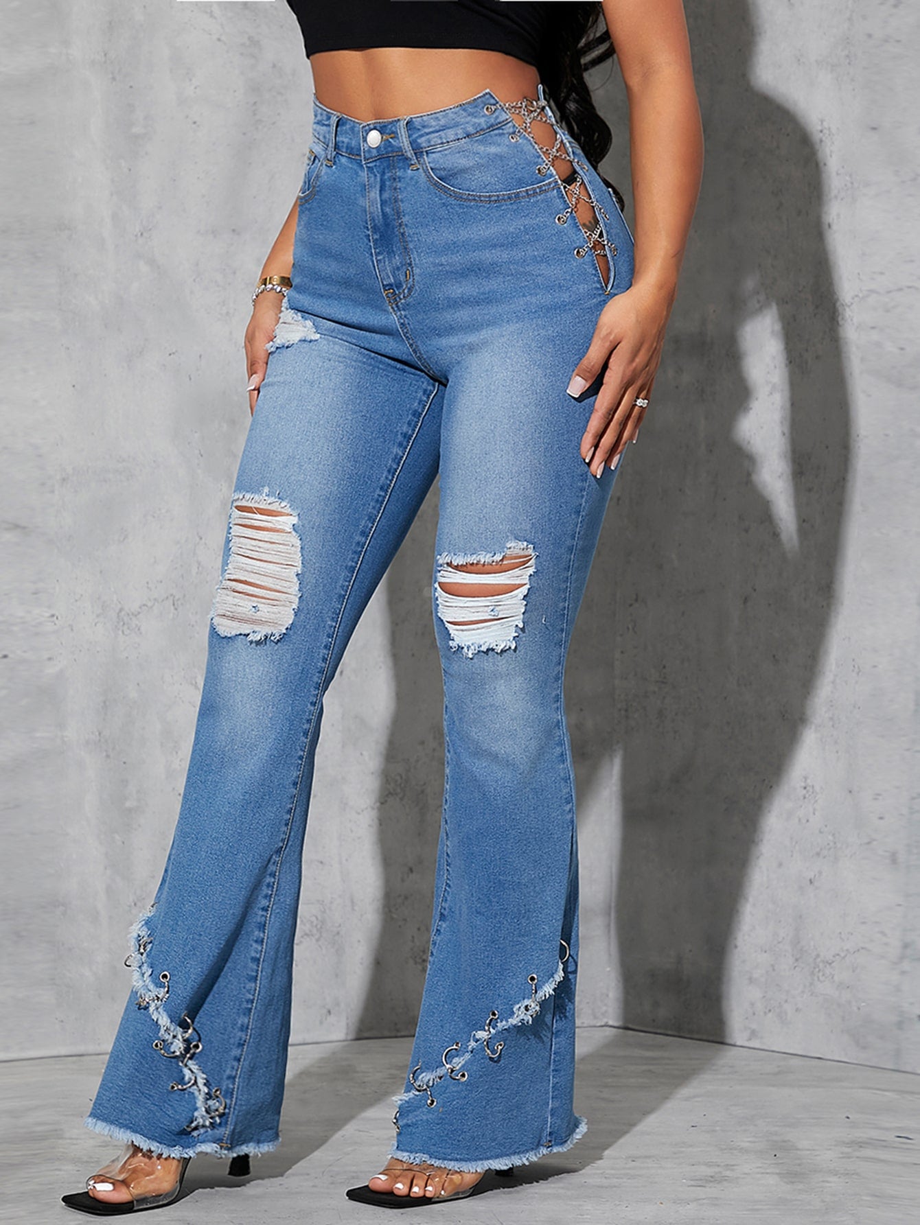 High Waist Ripped Criss Cross Chain Ring Raw Hem Flare Leg Jeans