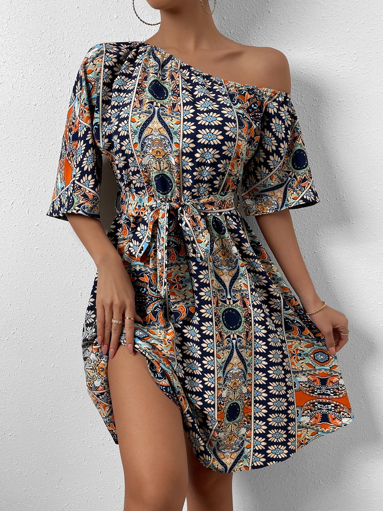 Allover Print Asymmetrical Neck Belted Dress