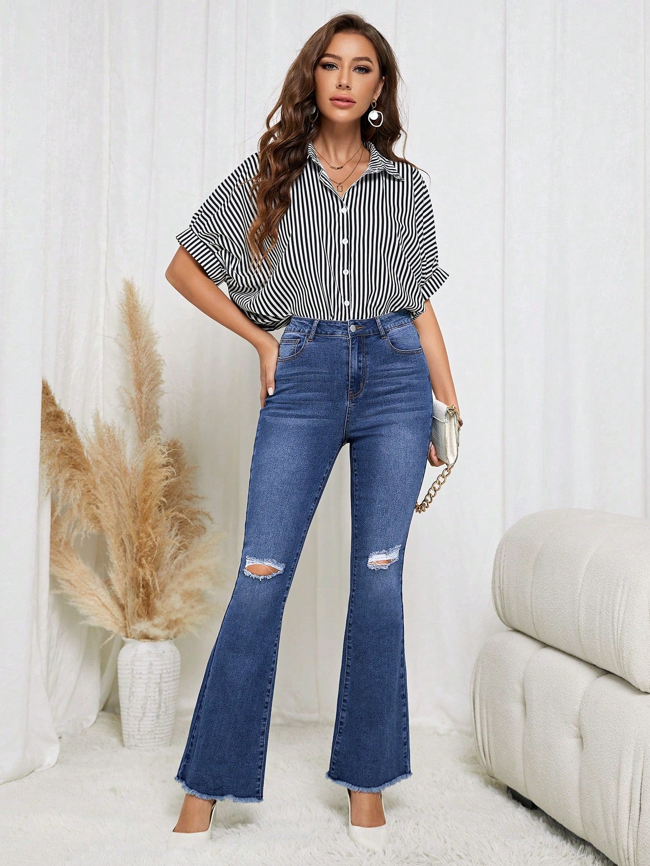 Mid Waist Ripped Raw Hem Flare Leg Jeans